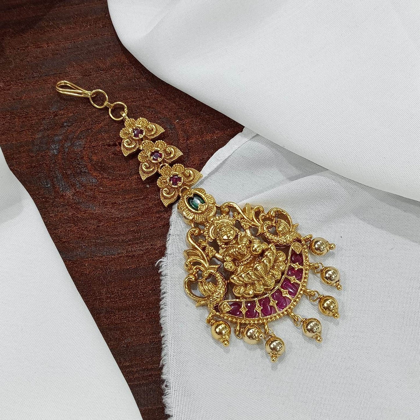Nagasi work with Kempu Stones Tikka - Nakshatra Jewels