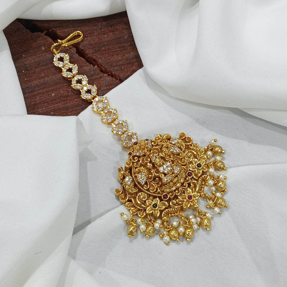 Nagasi work with Kempu Stones Tikka