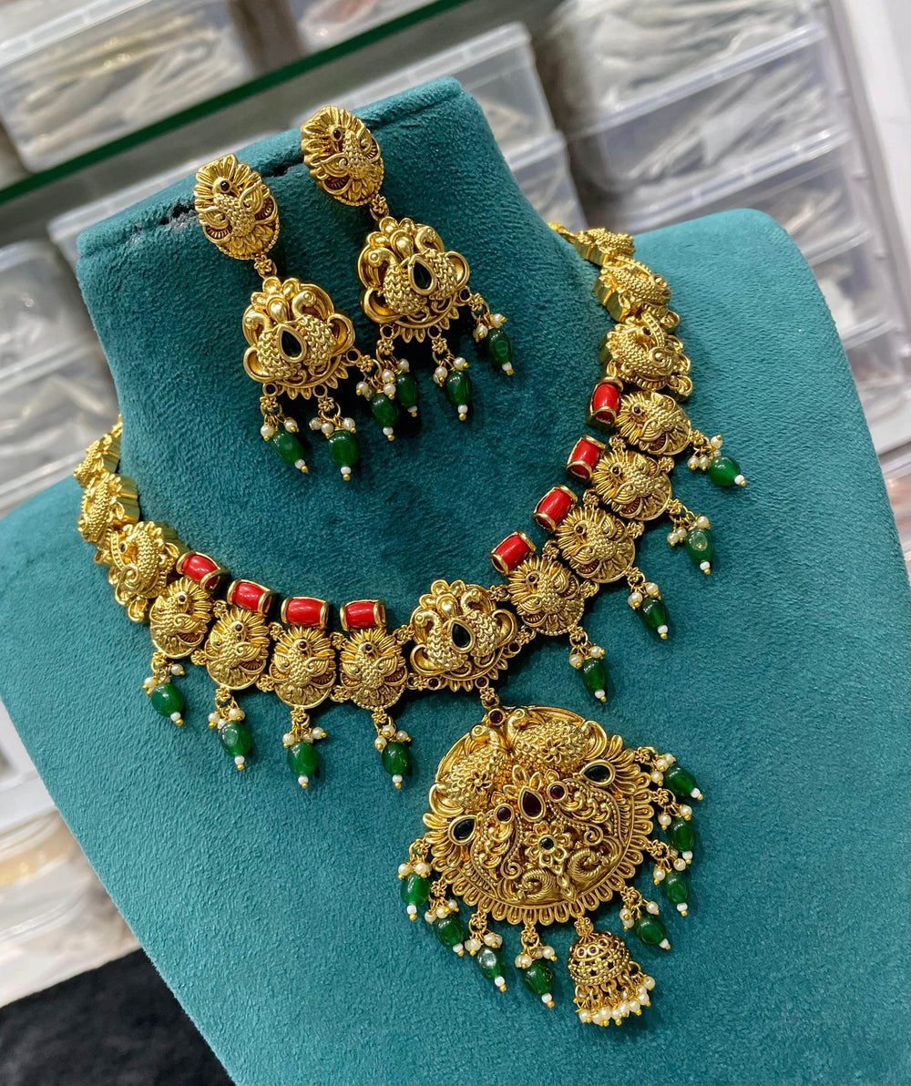 Nakshi Work with AD & Coral Studded Necklace - Nakshatra Jewels