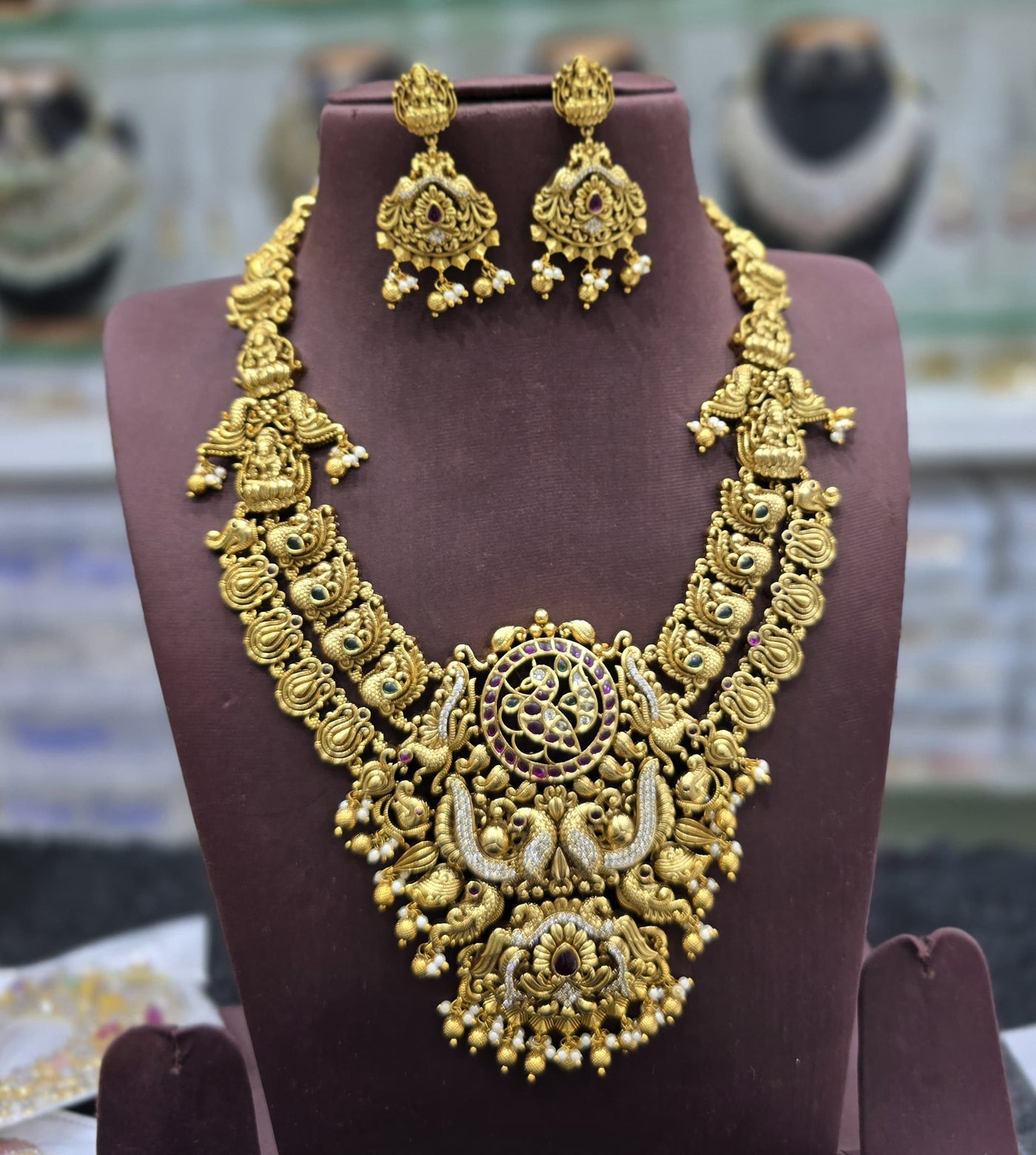 Nakshi Work with AD and Kempu Stones Bridal Necklace