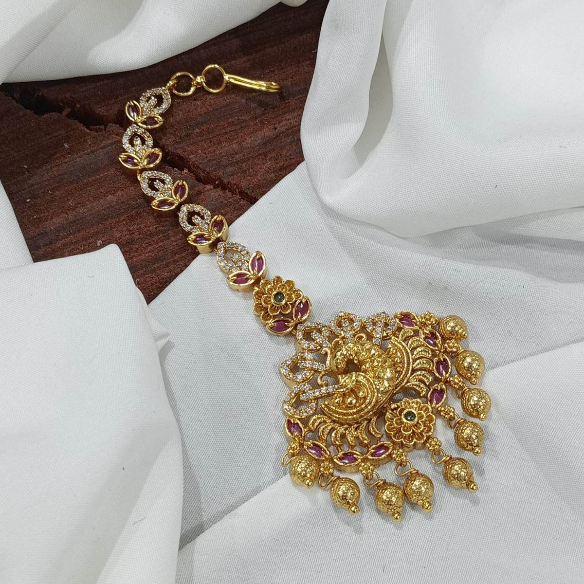 Nagasi work with Kempu Stones Tikka