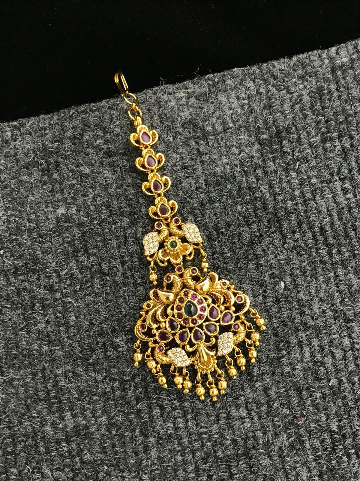 Nagasi work with Kempu Stones Tikka