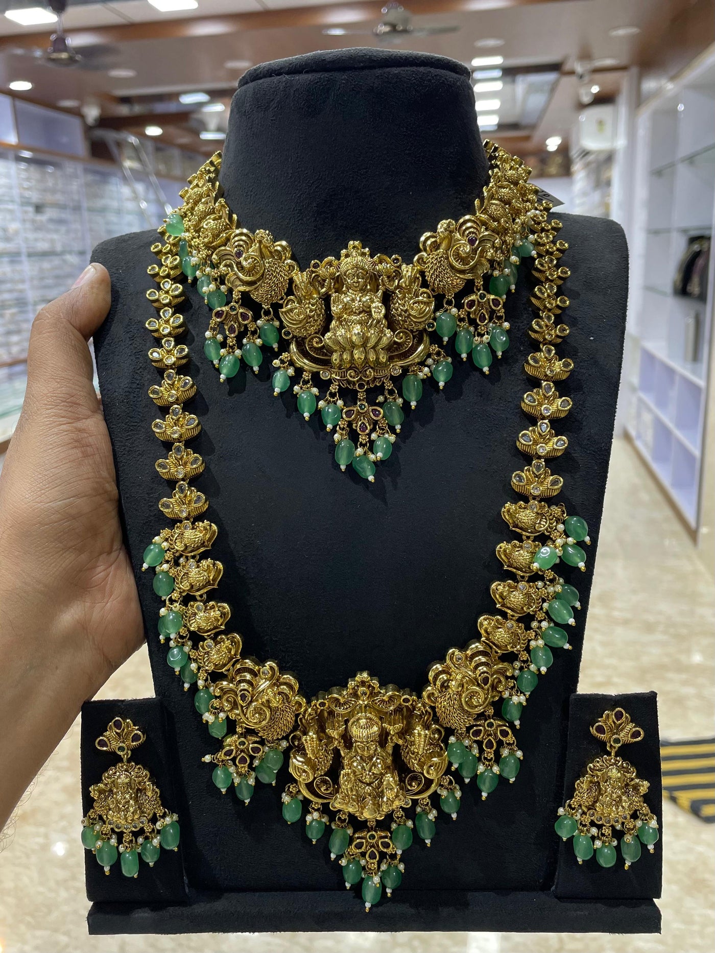 Nakshi work with Kempu Stones Bridal Combo Set