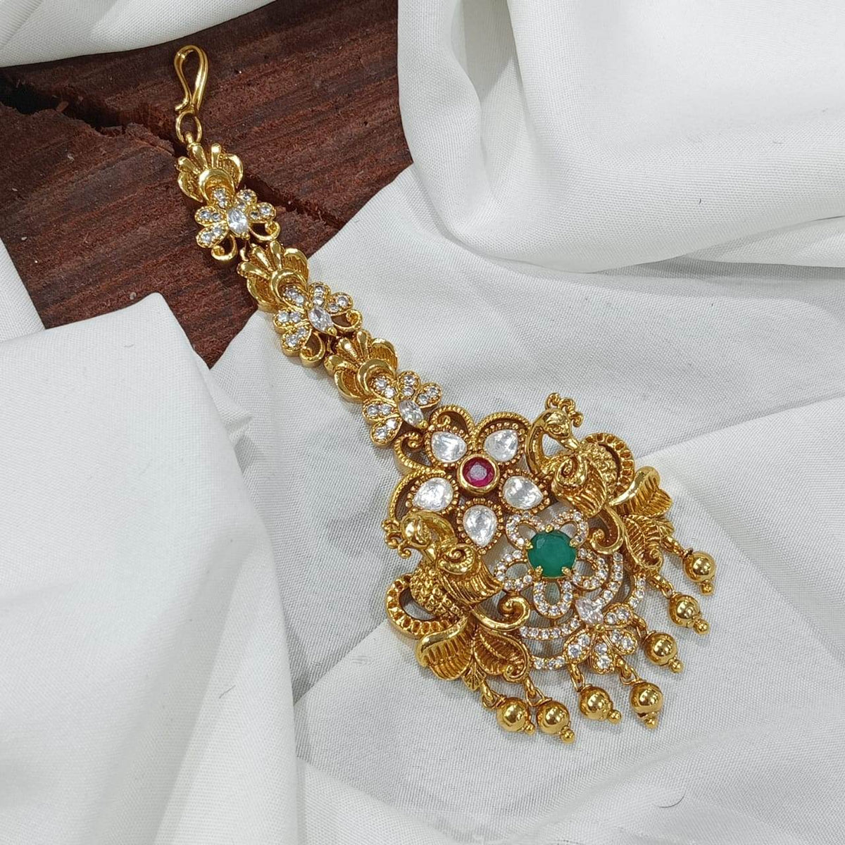 Nagasi work with Kempu Stones Tikka